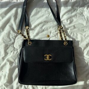 CHANEL Black Shoulder Bag with Gold Accents